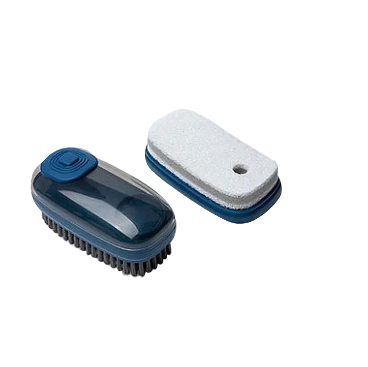 Cleaning brush with bristle and sponge heads on a white background